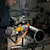 Small angle grinder being used to grind metal.